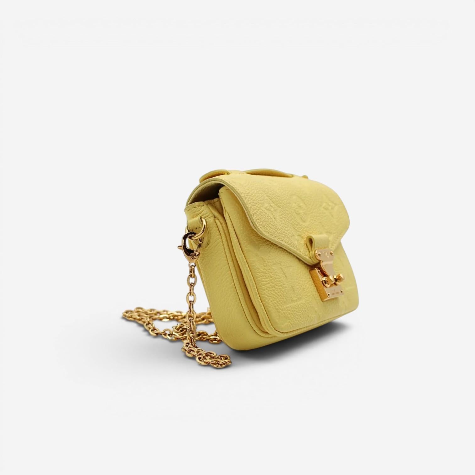 Louis Vuitton Metis Micro Yellow Monogram Empreinte Leather Crossbody Bag M81407