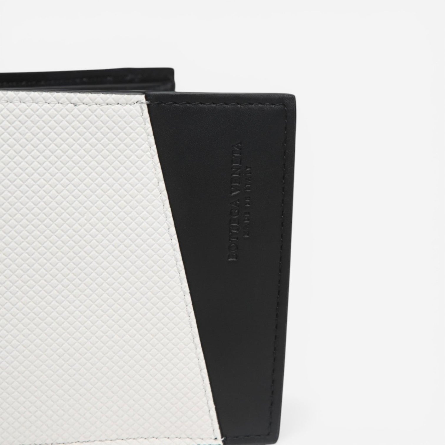 Bottega Veneta White & Black Leather Logo Embossed Bifold Wallet 575869VMAW49076