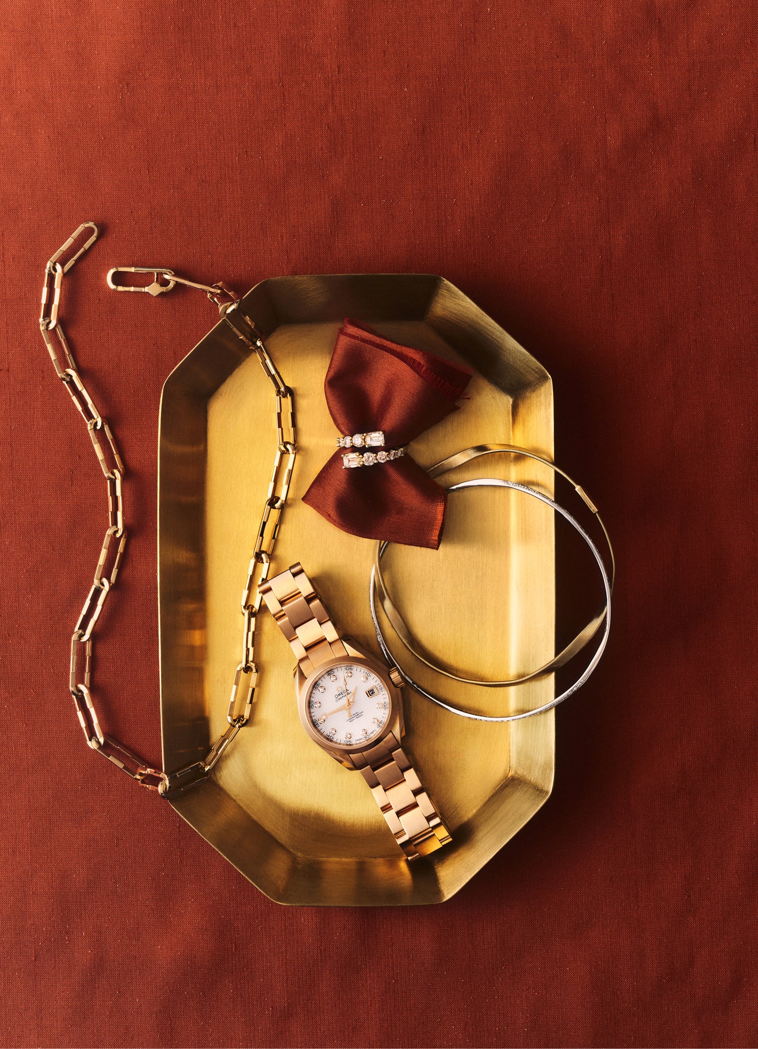 Jewelry and watch on tray