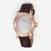 THE SOLIST Chopard Happy Sport oval watch in 18K rose gold with mother of pearl dial, floating diamonds, and brown strap