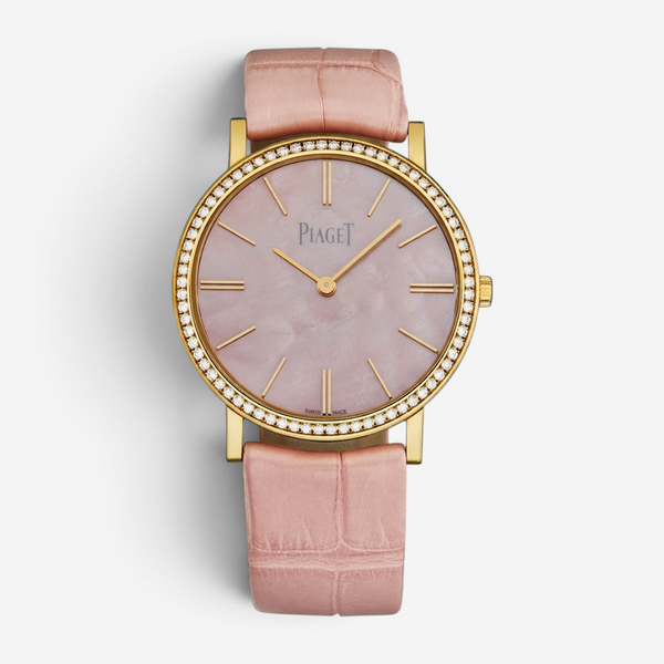 THE SOLIST Piaget Altiplano rose gold watch with diamond bezel, pink mother-of-pearl dial, and pink alligator strap.