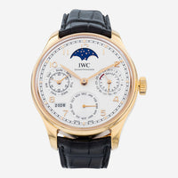 THE SOLIST IWC Portugieser rose gold automatic watch with white dial, moon phase, perpetual calendar, and black leather strap.