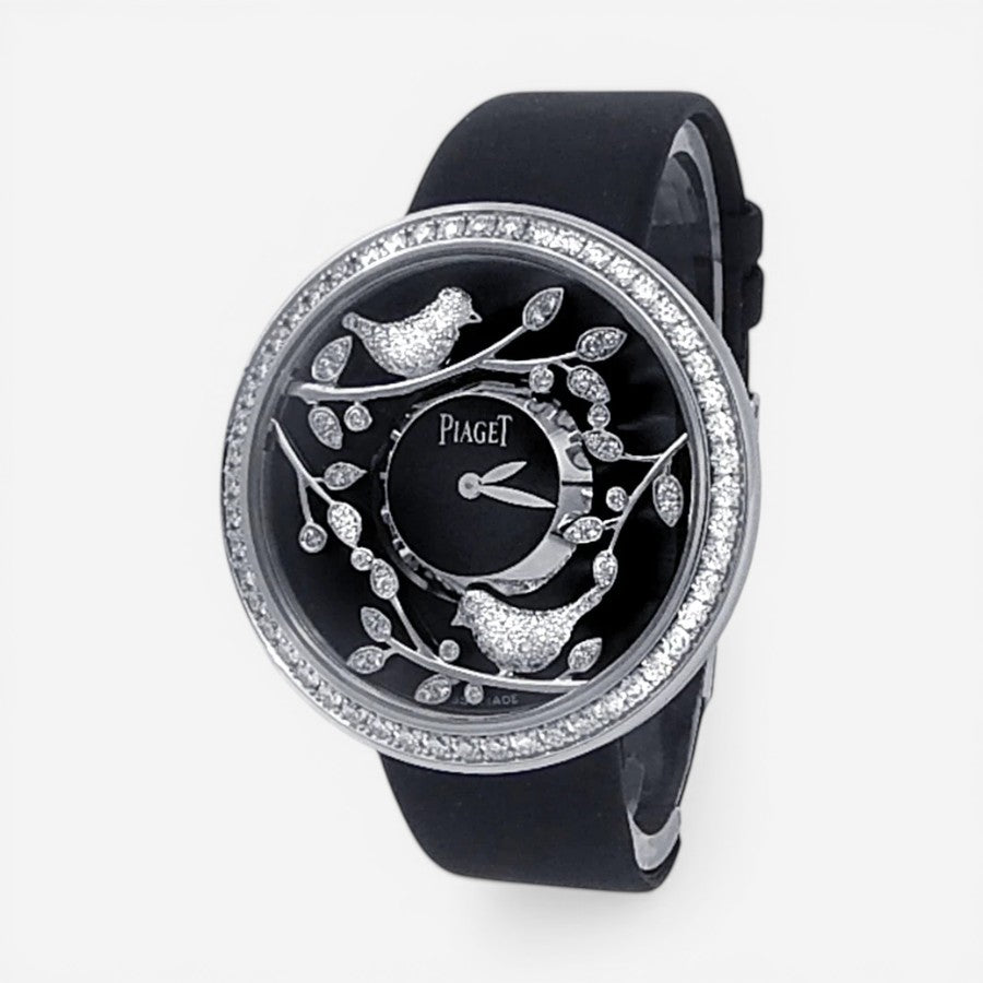 THE SOLIST Piaget Limelight 18k white gold ladies watch with diamond bezel, black dial, and bird motifs. Quartz movement.