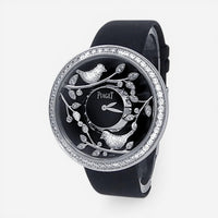 THE SOLIST Piaget Limelight 18k white gold ladies watch with diamond bezel, black dial, and bird motifs. Quartz movement.