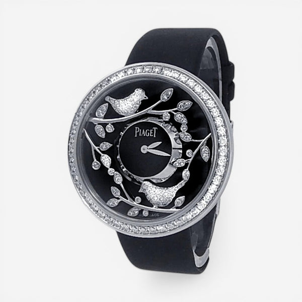 THE SOLIST Piaget Limelight 18k white gold ladies watch with diamond bezel, black dial, and bird motifs. Quartz movement.