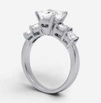 THE SOLIST 18K white gold engagement ring featuring a 2.01-carat radiant-cut diamond and side accent stones.