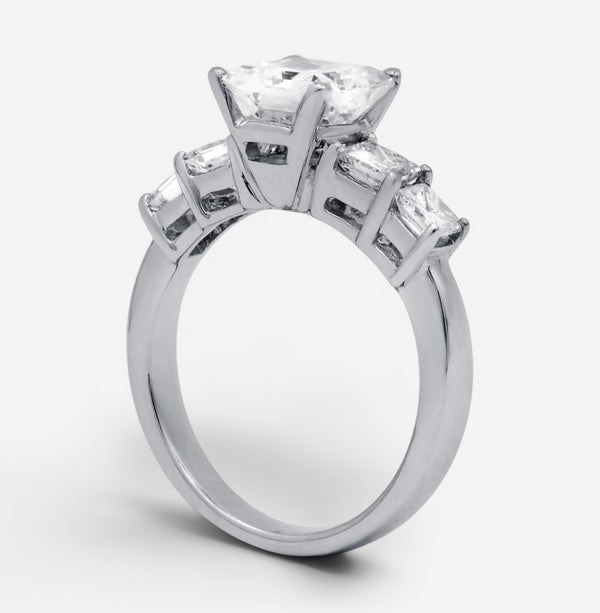 THE SOLIST 18K white gold engagement ring featuring a 2.01-carat radiant-cut diamond and side accent stones.