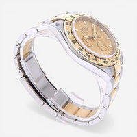 THE SOLIST Rolex Daytona men's watch with champagne dial, stainless steel and 18k gold two-tone bracelet and bezel. Features automatic movement and chronograph.
