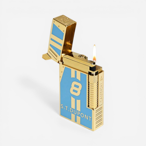 THE SOLIST S.T. Dupont Le Mans Limited Edition lighter in gold and blue lacquer with racing stripes and the number 8.